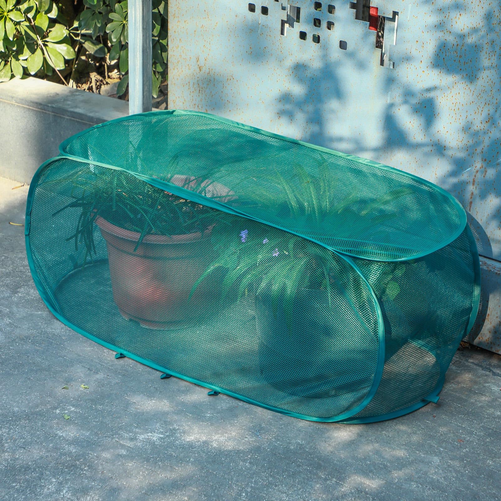 Threehoney crop cage net shields crops while allowing sunlight.