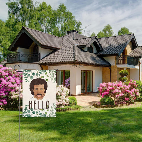 Thriano Hello Funny Garden Flag fluttering in the breeze brightens the garden.