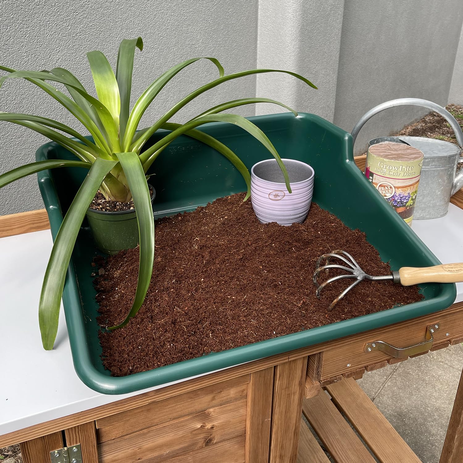 Tierra Garden Garden Tidy Tray is lightweight and portable for easy repositioning.