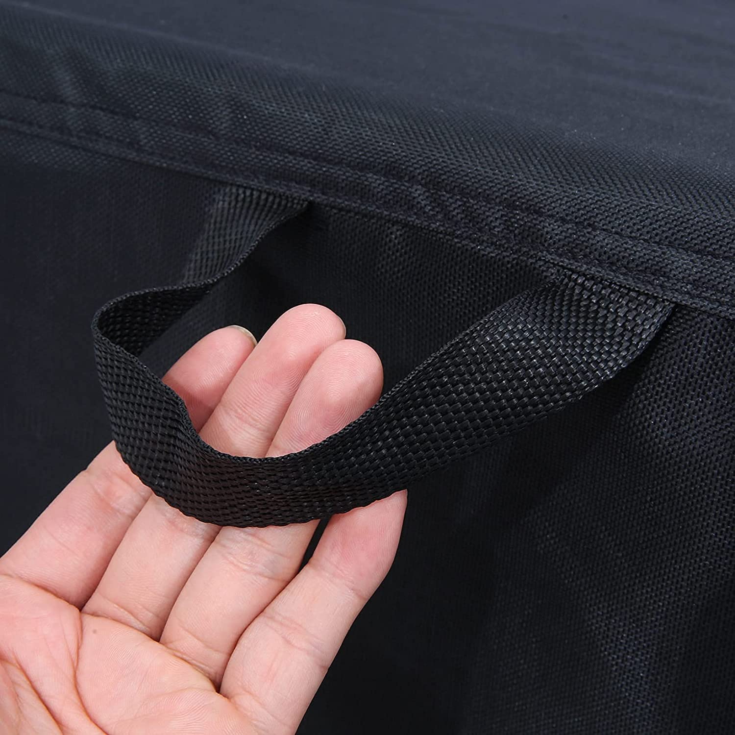 TIFILE four click-close straps secure the cover during windy conditions.