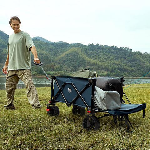 Timber Ridge wagon with brakes and large wheels for stable movement on sand.