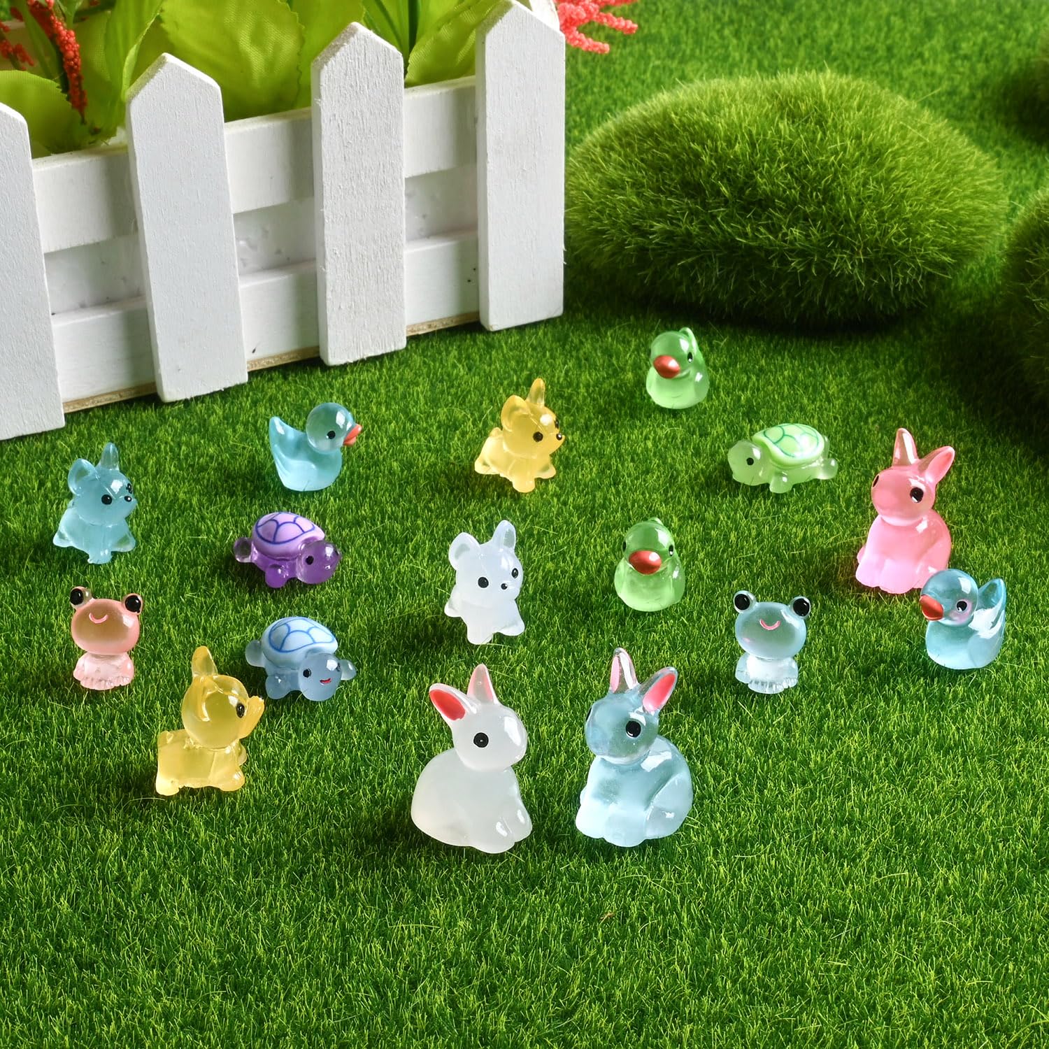 TINGLAN 150-piece mini resin animals duck creates a whimsical focal point with glow-in-the-dark charm.