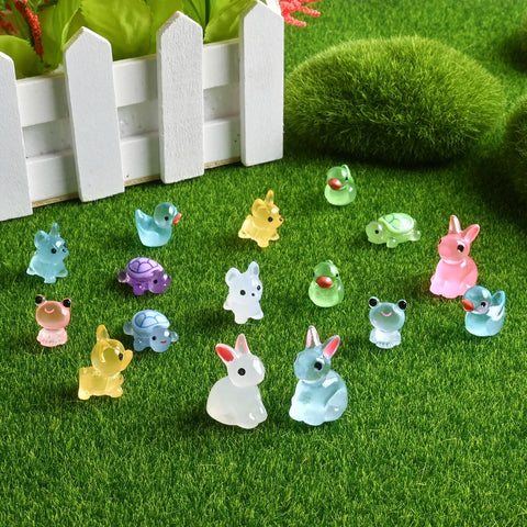 TINGLAN 150-piece mini resin animals duck creates a whimsical focal point with glow-in-the-dark charm.