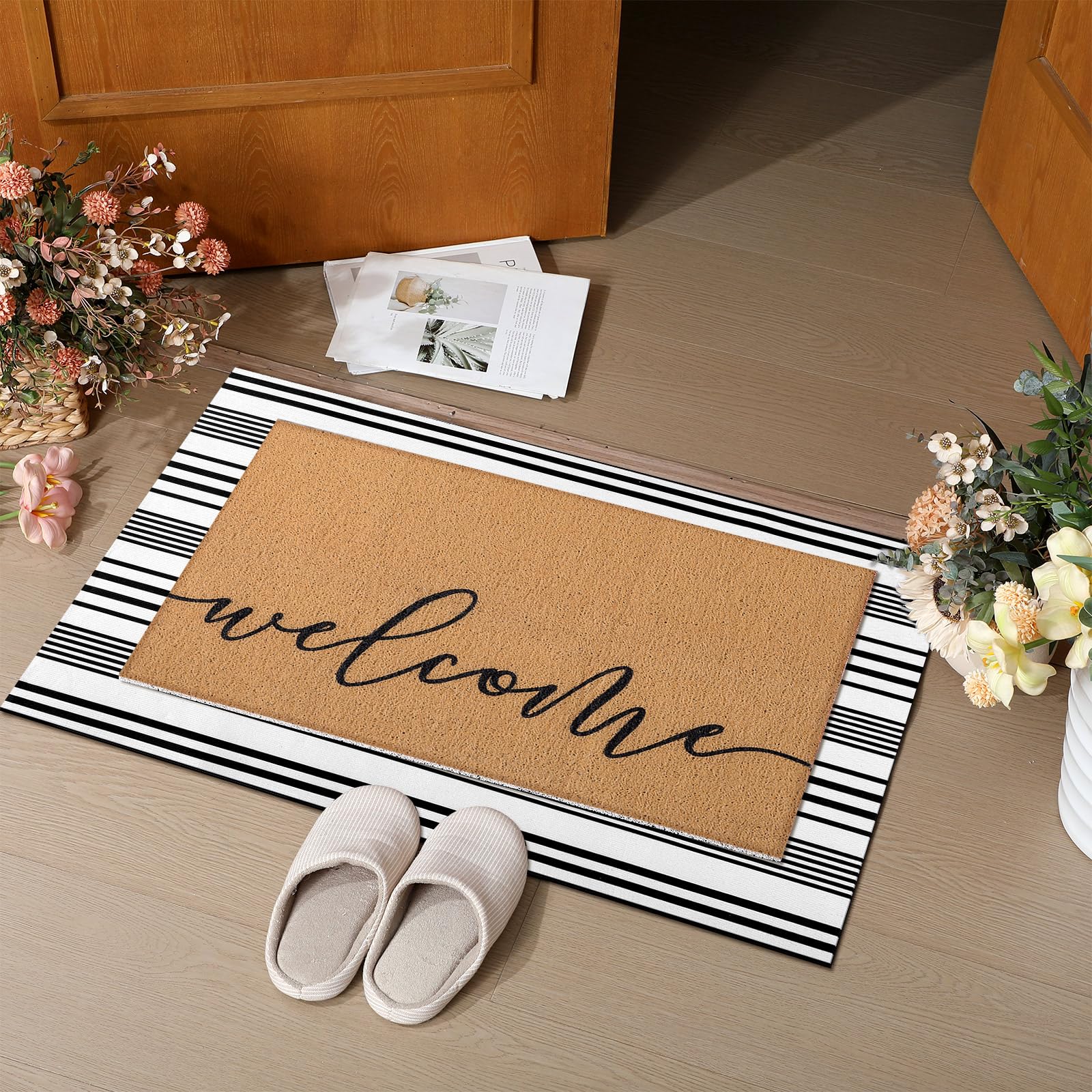 Tinideya black-white striped mat adds stylish layered entryway decor.