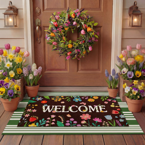 Tinideya welcome mat with black letters and flowers adds warm curb appeal.