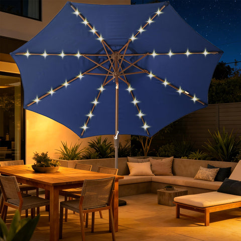 Tioline 9ft umbrella lights on, casting a warm glow for outdoor evenings.