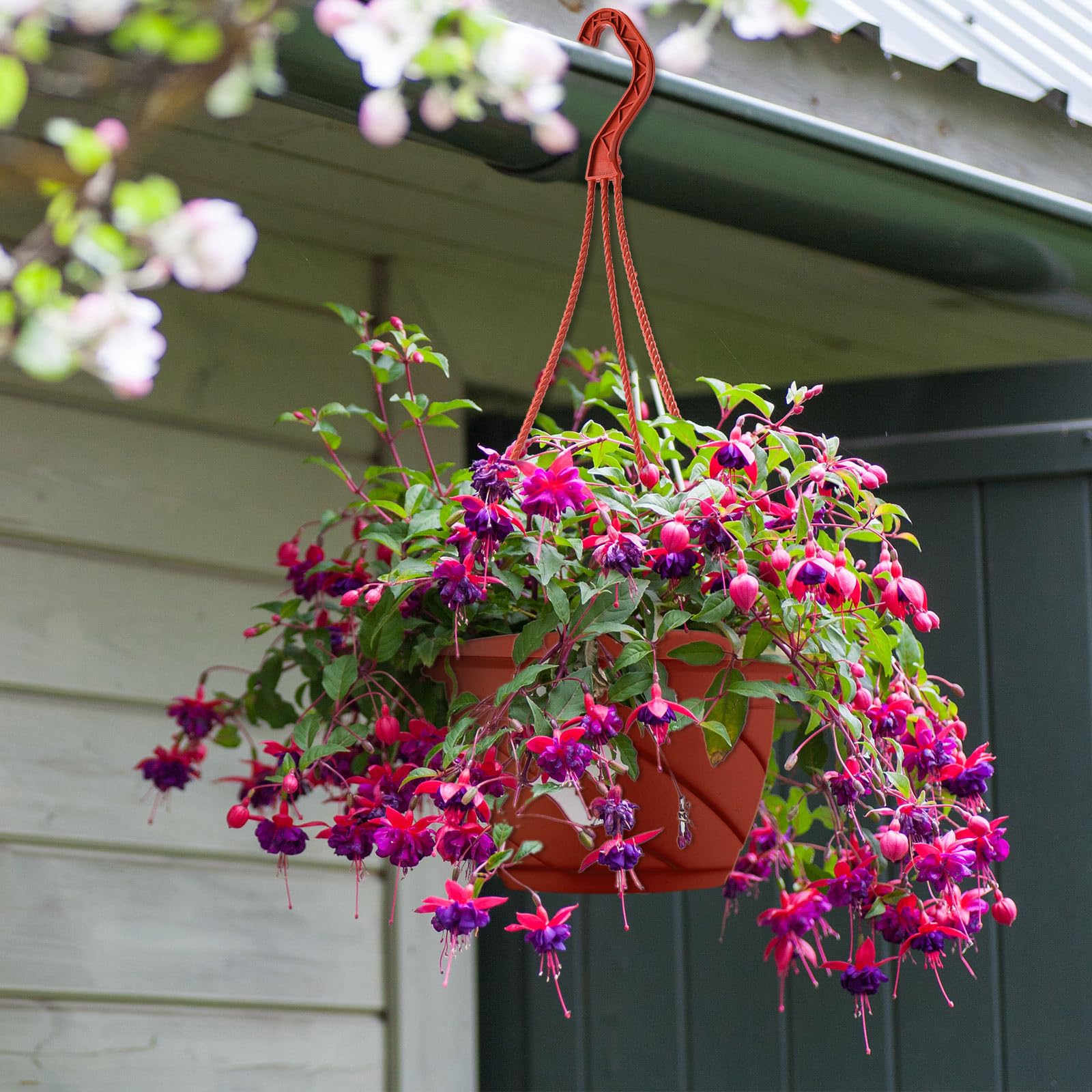 Lightweight plastic hanging plant container for indoor and outdoor use.