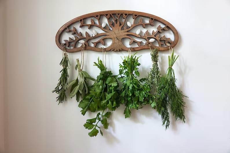 Tnstbiee Tree of Life rack saves space while drying multiple herb bundles.