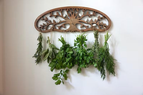 Tnstbiee Tree of Life rack saves space while drying multiple herb bundles.
