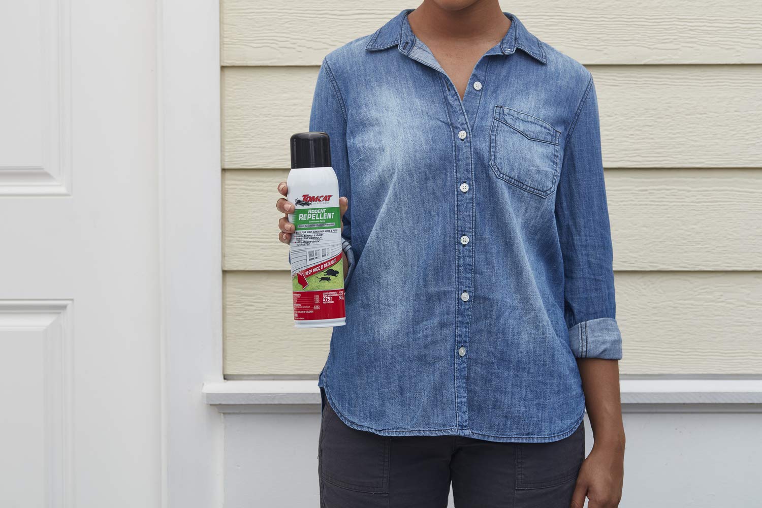 Tomcat Rodent Repellent rain resistant spray shown outdoors.