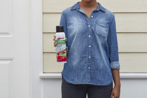 Tomcat Rodent Repellent rain resistant spray shown outdoors.