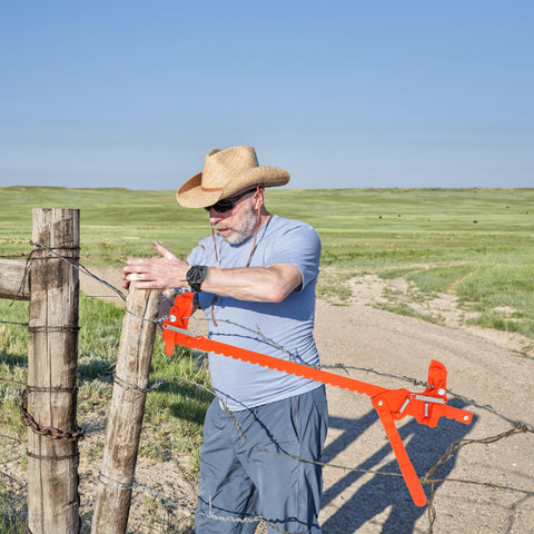 TOMESHA heavy-duty fence tool in outdoor use for farm and ranch projects.