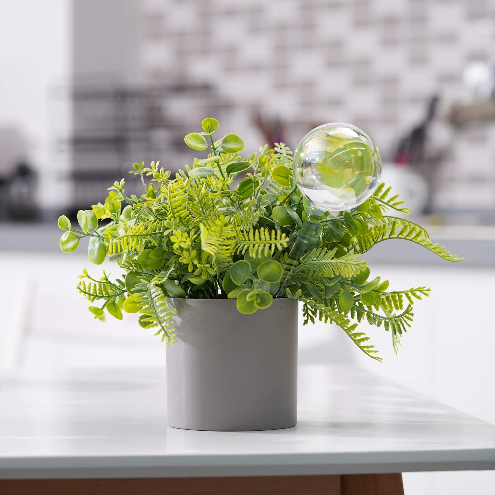Tomorotec gradient color waterer bulbs, low-maintenance hydration for balcony planters.