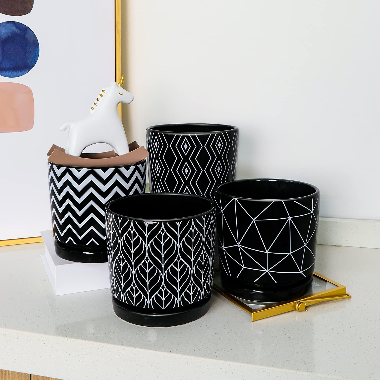 Ton Sin plant pot with saucer, reduces water runoff and spills.