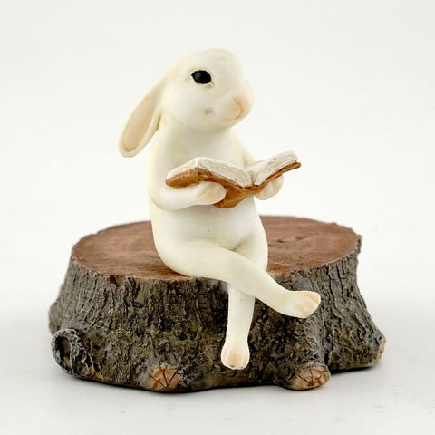 Top Collection bunny reading on stump statue enhances cozy shelves and fairy garden scenes.