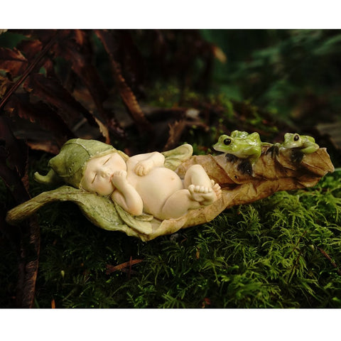Top Collection hand-painted fairy garden statue detail highlights fine craftsmanship for terrariums.