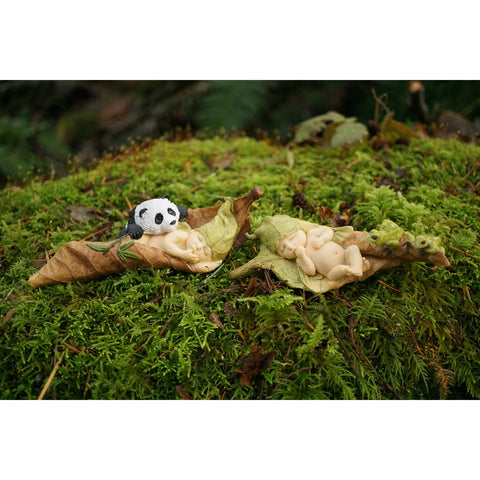 Top Collection miniature fairy garden scene invites imaginative display in homes and gardens.