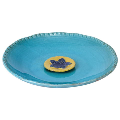 Topadorn birdbath with blue glaze inviting birds to sip and bathe