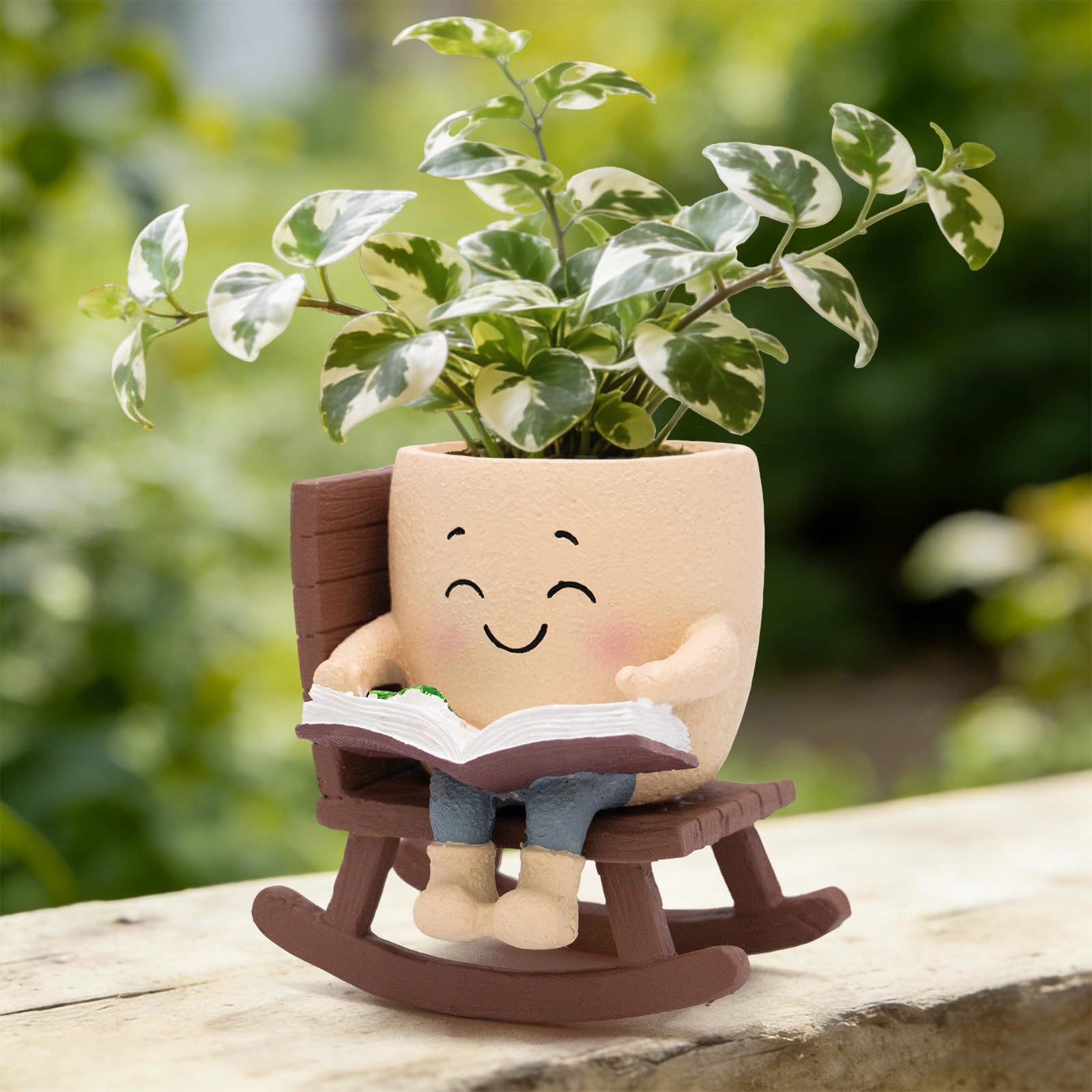 Toparad Smily Face rocking chair planter with book adds cozy decor for plants.