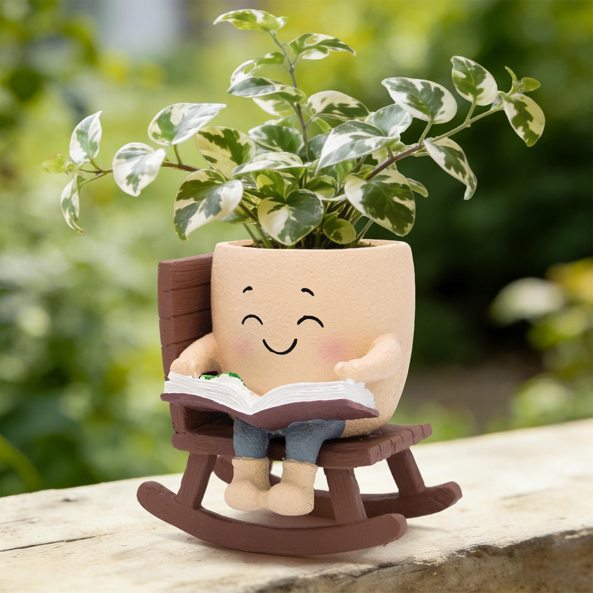 Toparad Smily Face rocking chair planter with book adds cozy decor for plants.