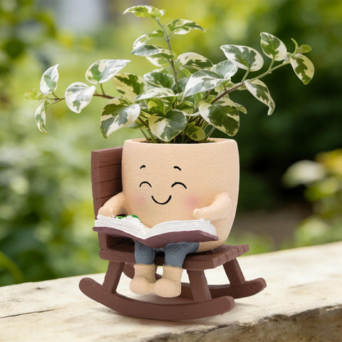 Toparad Smily Face rocking chair planter with book adds cozy decor for plants.