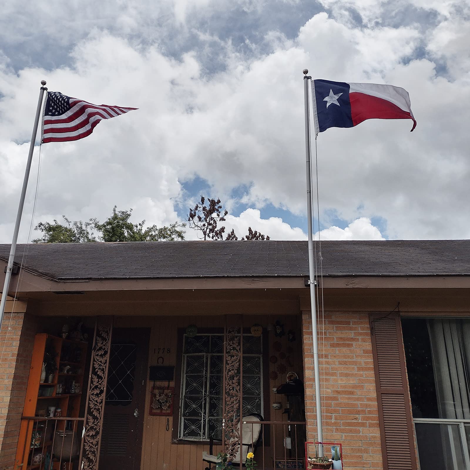 TOPFLAGS Texas flag with embroidered stars for premium detail.