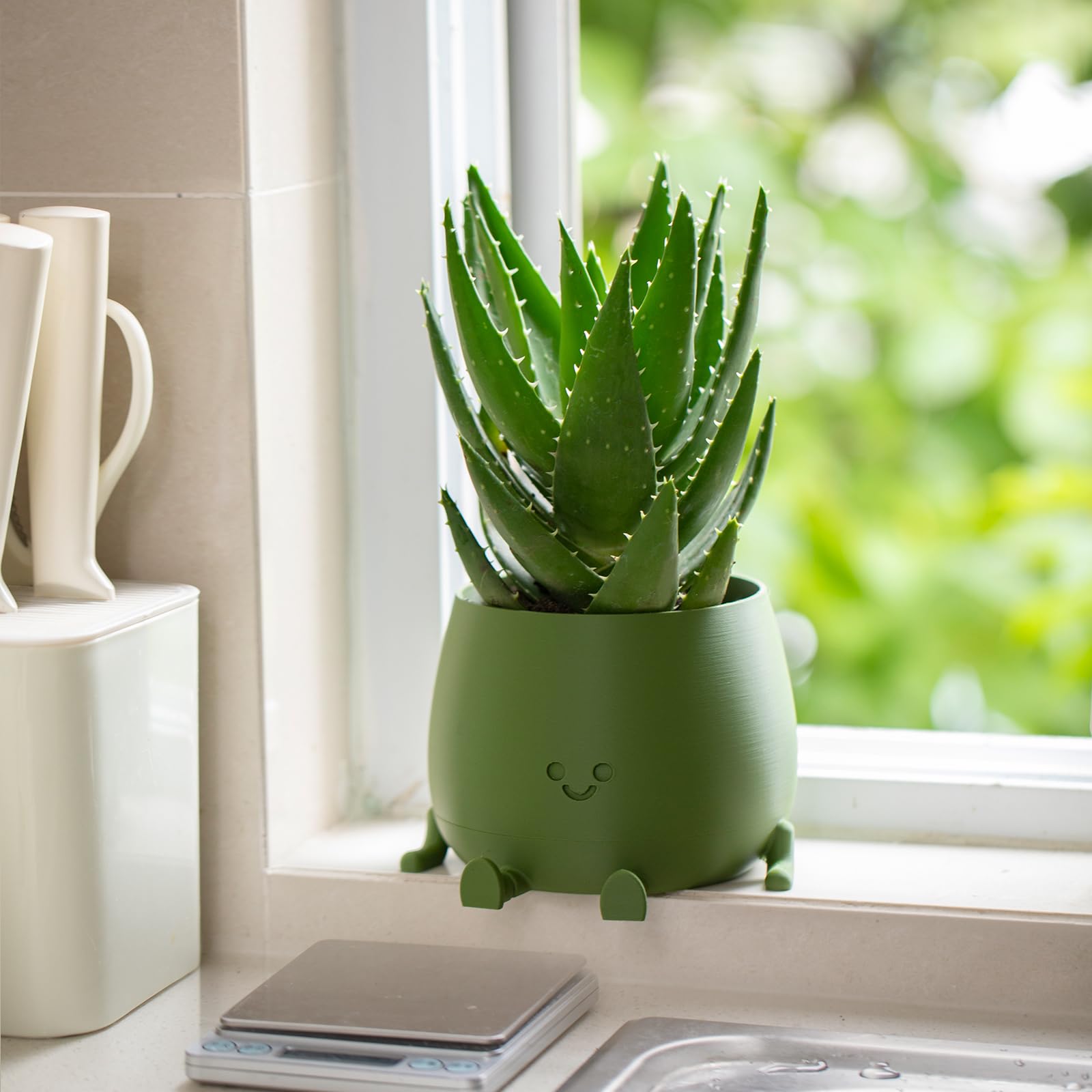 TOPOLA Happy Face Planter drainage holes prevent overwatering