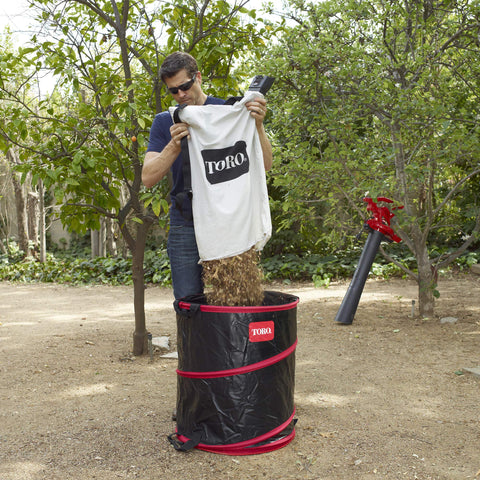 Toro 51503 white bag showing bottom zipper for durable, simple emptying.