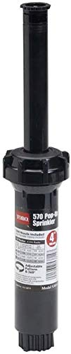 Toro 570 Series sprinkler with 15-foot adjustable nozzle for flexible watering patterns.