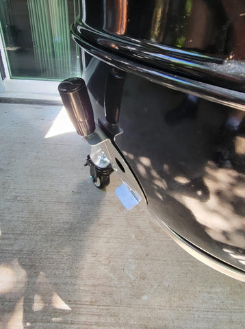 Total Control thumb-damper handle on Weber Smokey Mountain offers comfortable grip