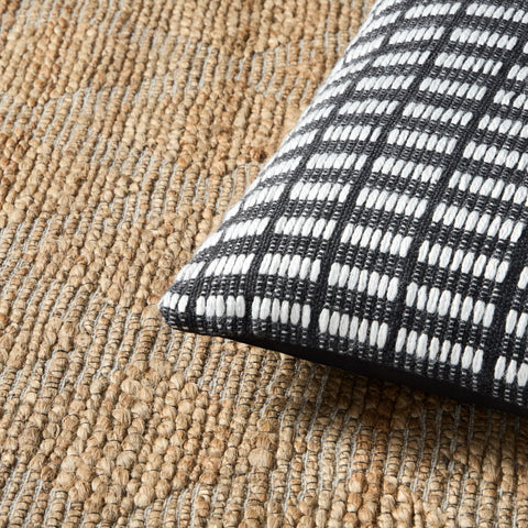 Town & Country Terra Alara water-repellent textile shields cushions in light rain.