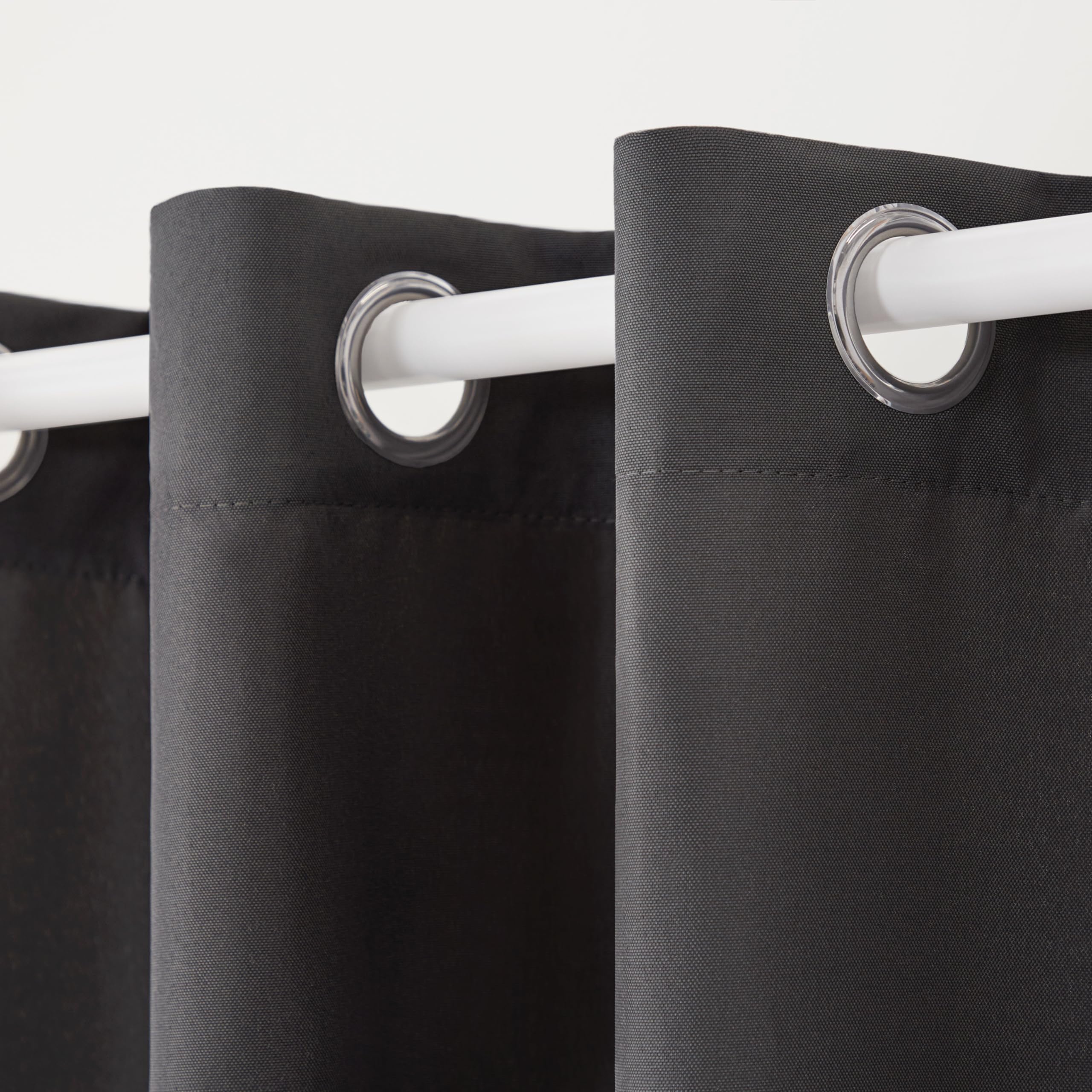Town & Country Basics Cabana curtains water-repellent fabric ideal for patios and sunrooms.