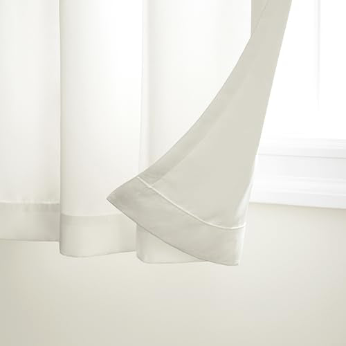 Grommet-top detail on Town and Country Basics Cabana curtain in vanilla for easy hanging.