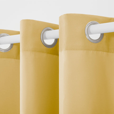 Town & Country Basics Cabana solid curtains with eight grommets for easy outdoor mounting.