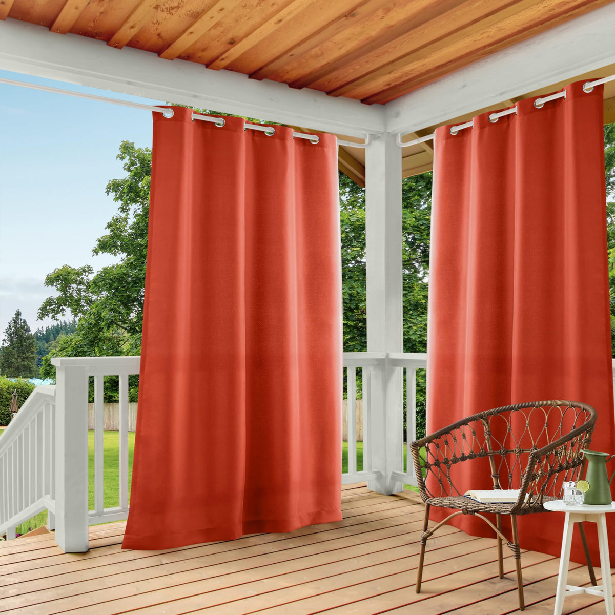 TOWN AND COUNTRY BASICS Cabana curtains in Mecca Orange provide light filtering and privacy.