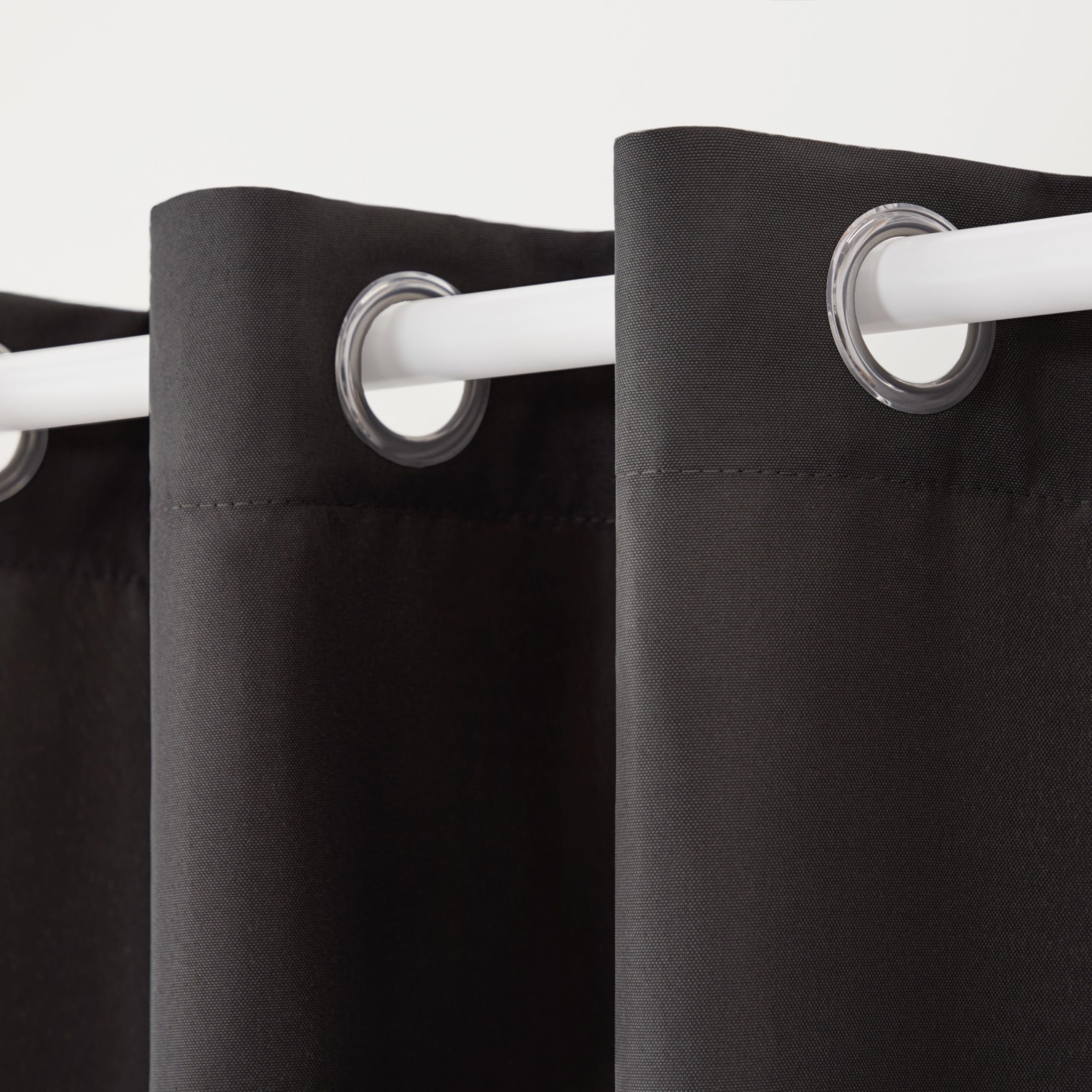 Town & Country Basics Cabana solid light-filtering privacy curtain panel for daylit spaces.