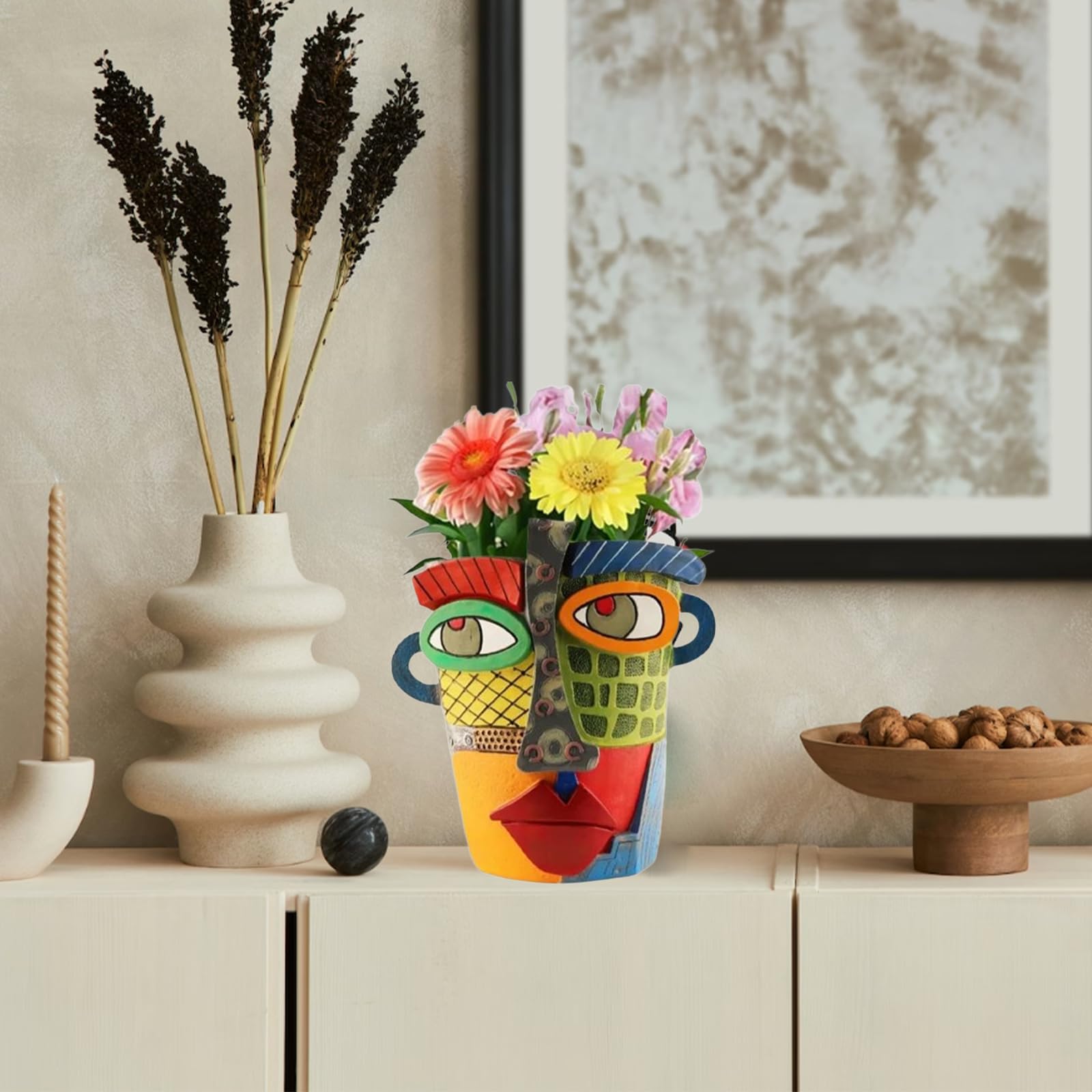 TOZLU Picasso face art planter offers vivid color and versatile planting options.