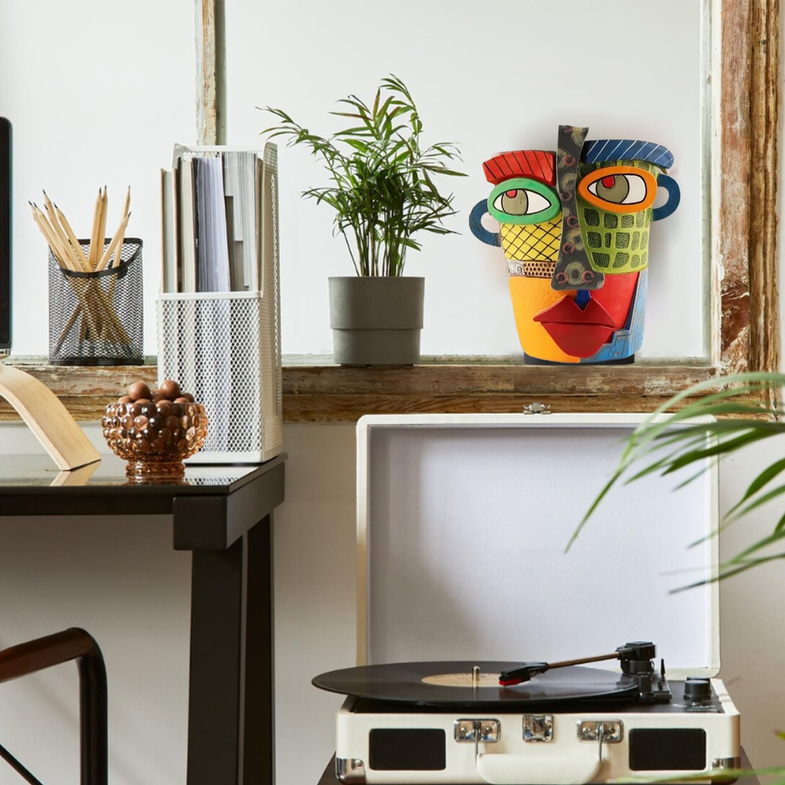 TOZLU Picasso head planter as a bold statement piece for home or office.