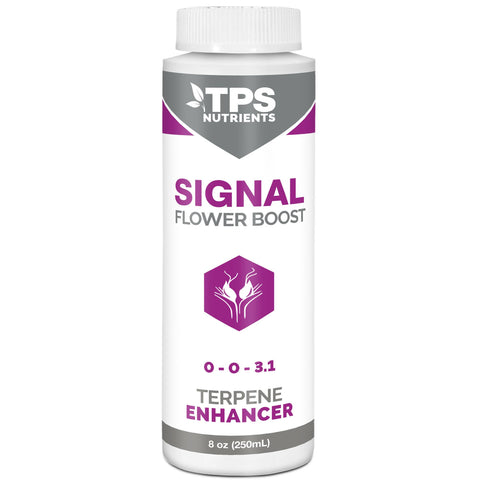 TPS Nutrients Signal Terpene Enhancer bottle beside a blooming plant.