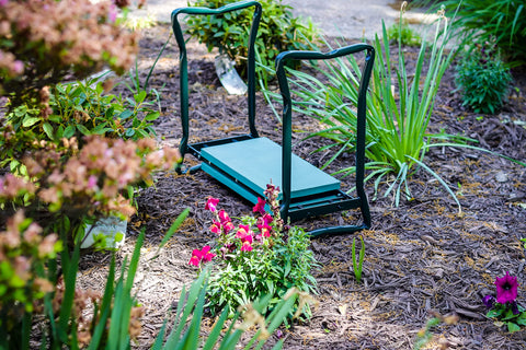 Trademark Innovations garden kneeler flipped to seat position for elevated gardening tasks.