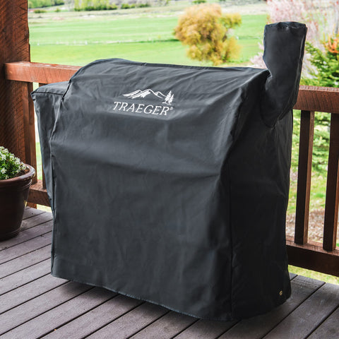 Traeger BAC380 cover, side view, guards against snow and wind while grilling