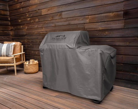 Traeger BAC761 cover on Woodridge grill side view shields from snow and UV exposure