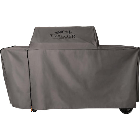 Traeger BAC776 all-weather cover protecting Woodridge Pro from rain and sun