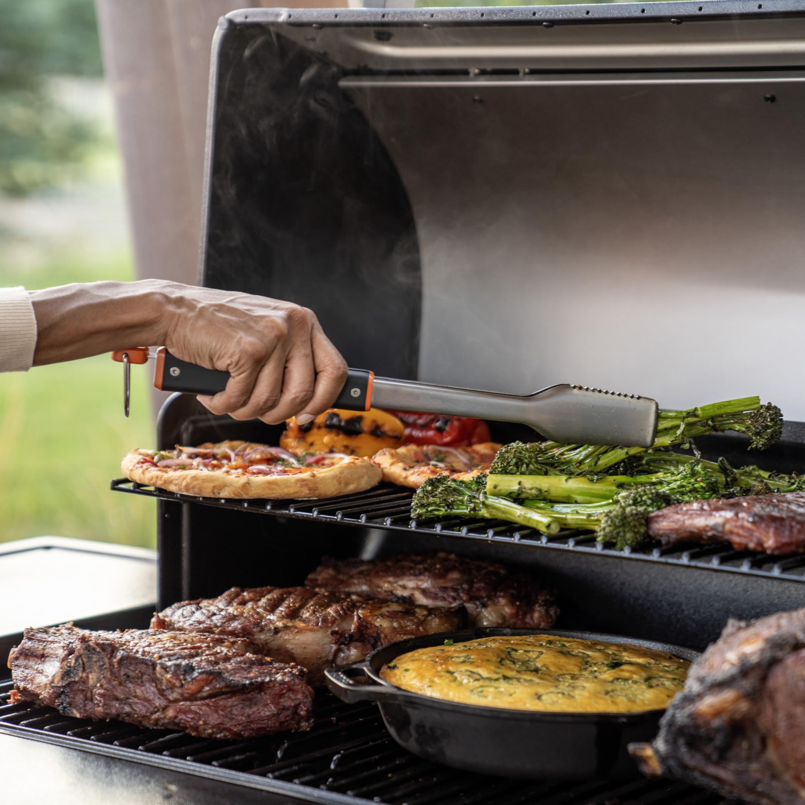 Traeger BAC790 serrated grip tongs for reliable burger and veggie flipping.
