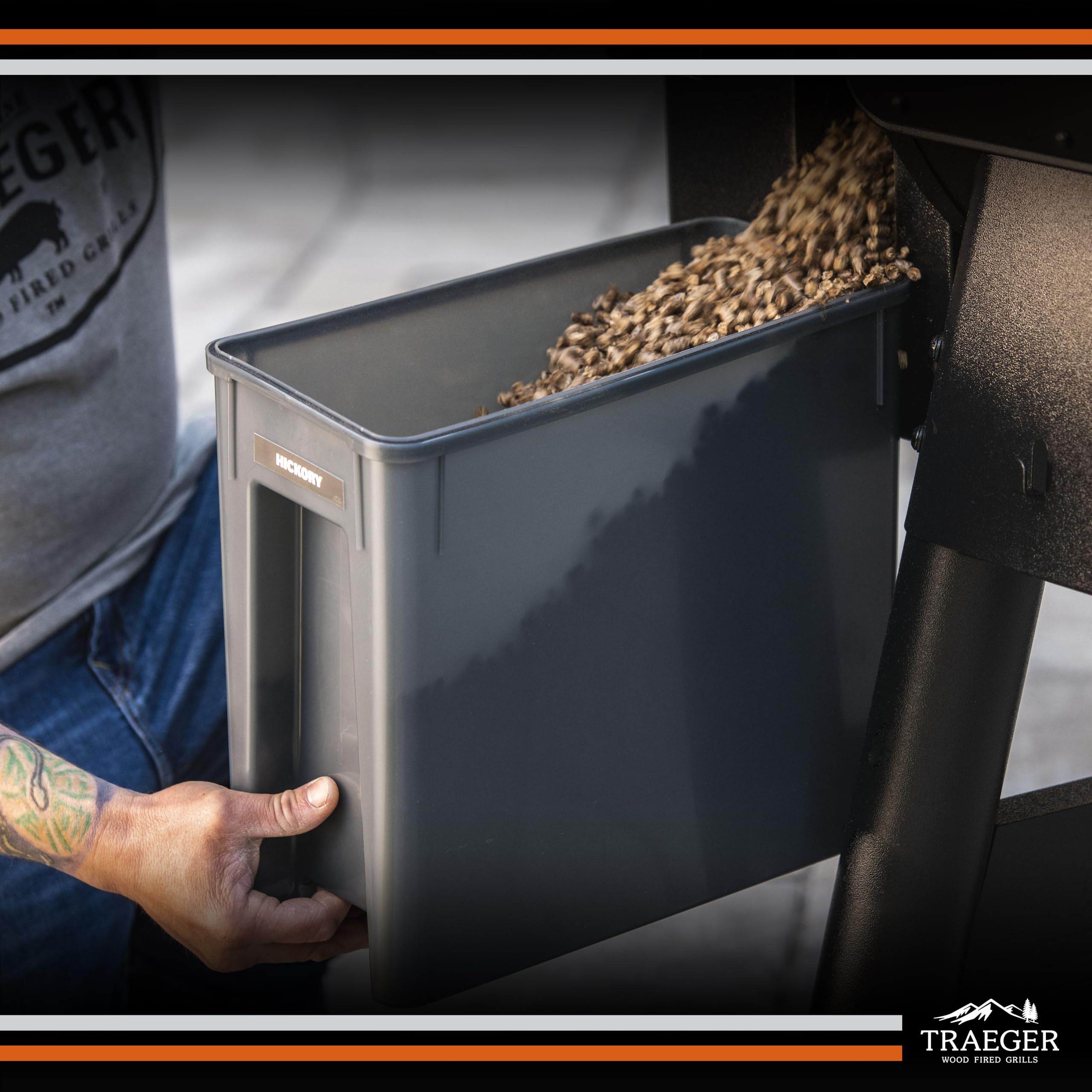 Open lid on Traeger StayDry bin for easy access and quick pellet swapping.