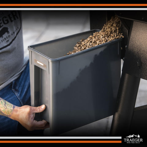 Open lid on Traeger StayDry bin for easy access and quick pellet swapping.