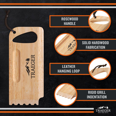 Traeger scraper with hanging loop for easy outdoor storage beside a grill.