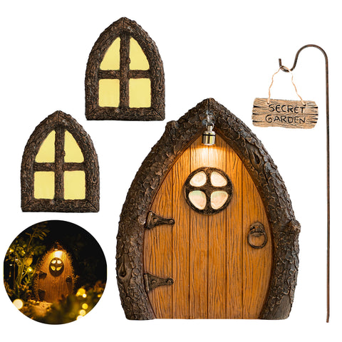 Tree Poetry fairy door attached to a tree trunk with glow-in-the-dark accents.