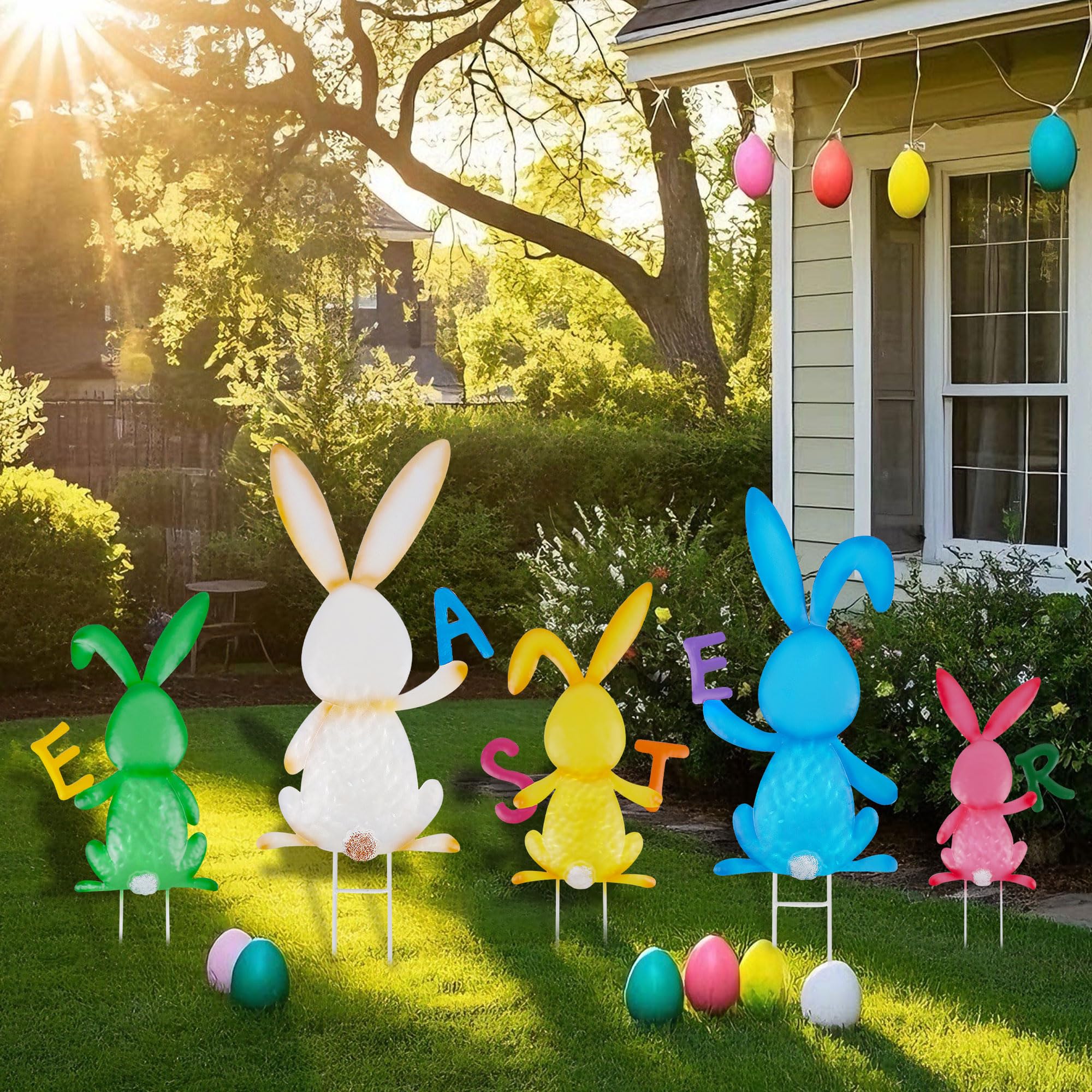 Treewoll bunny stake with yellow finish stands out in the yard.