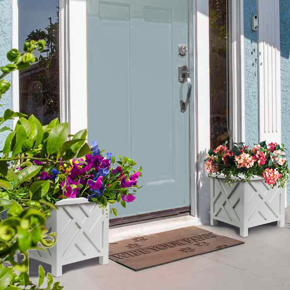 Trenton Gifts Chippendale white planters with plants demonstrate generous planting space.